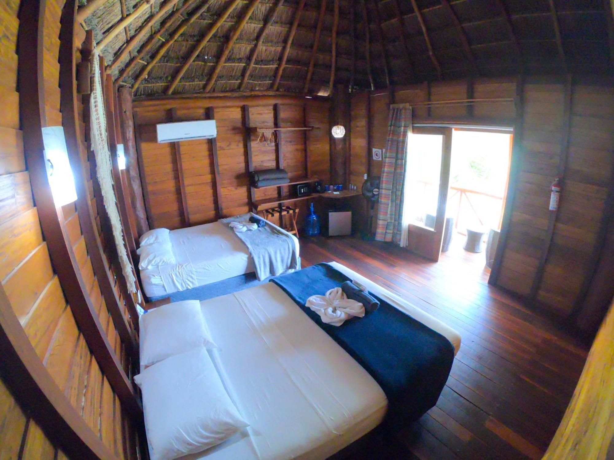 Palmeras De Mahahual Cabanas Стая снимка