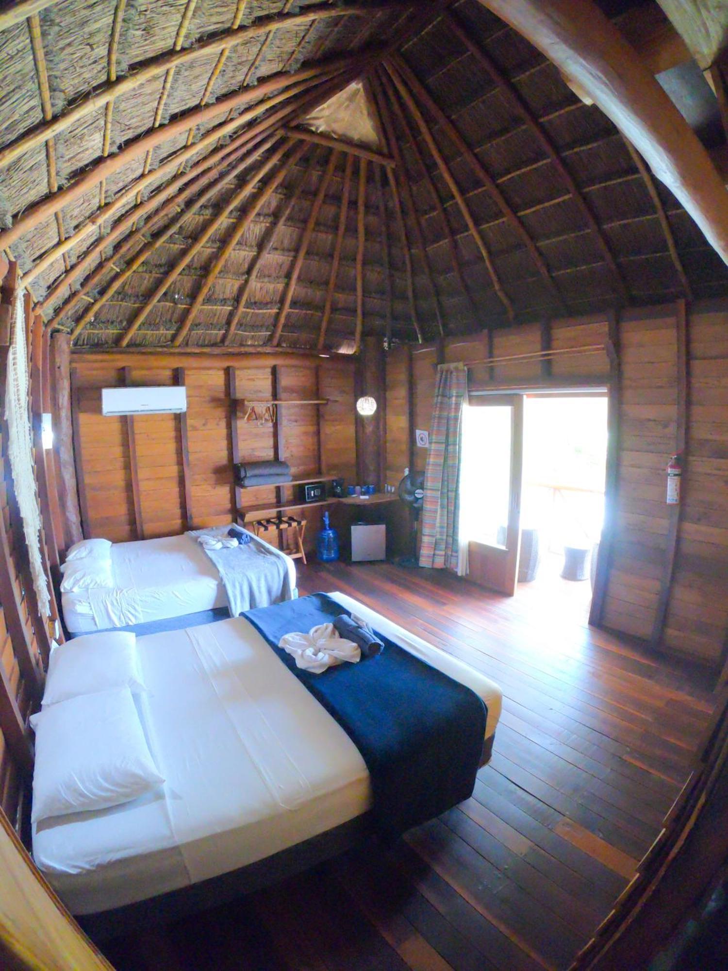 Palmeras De Mahahual Cabanas Стая снимка