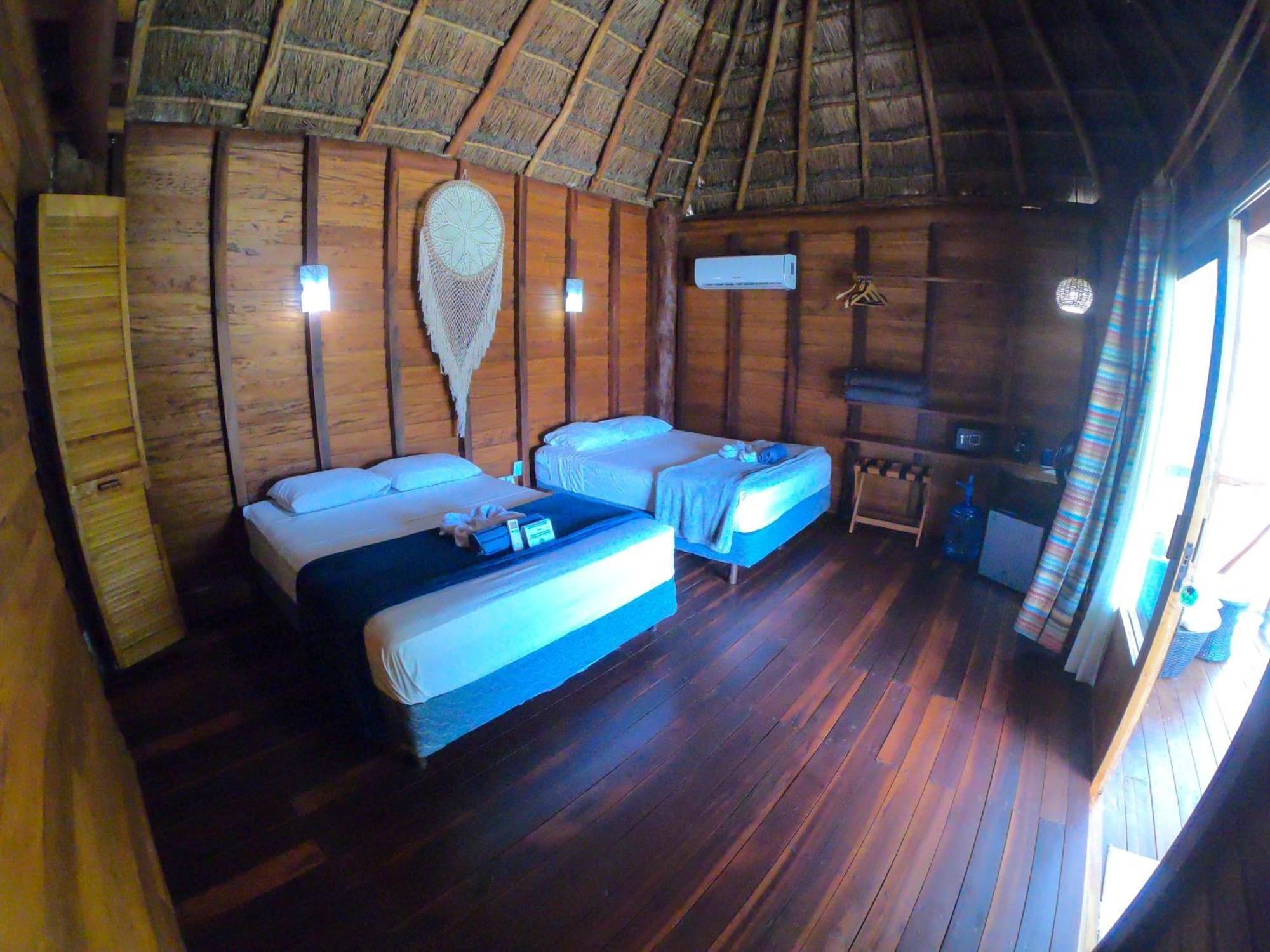 Palmeras De Mahahual Cabanas Стая снимка
