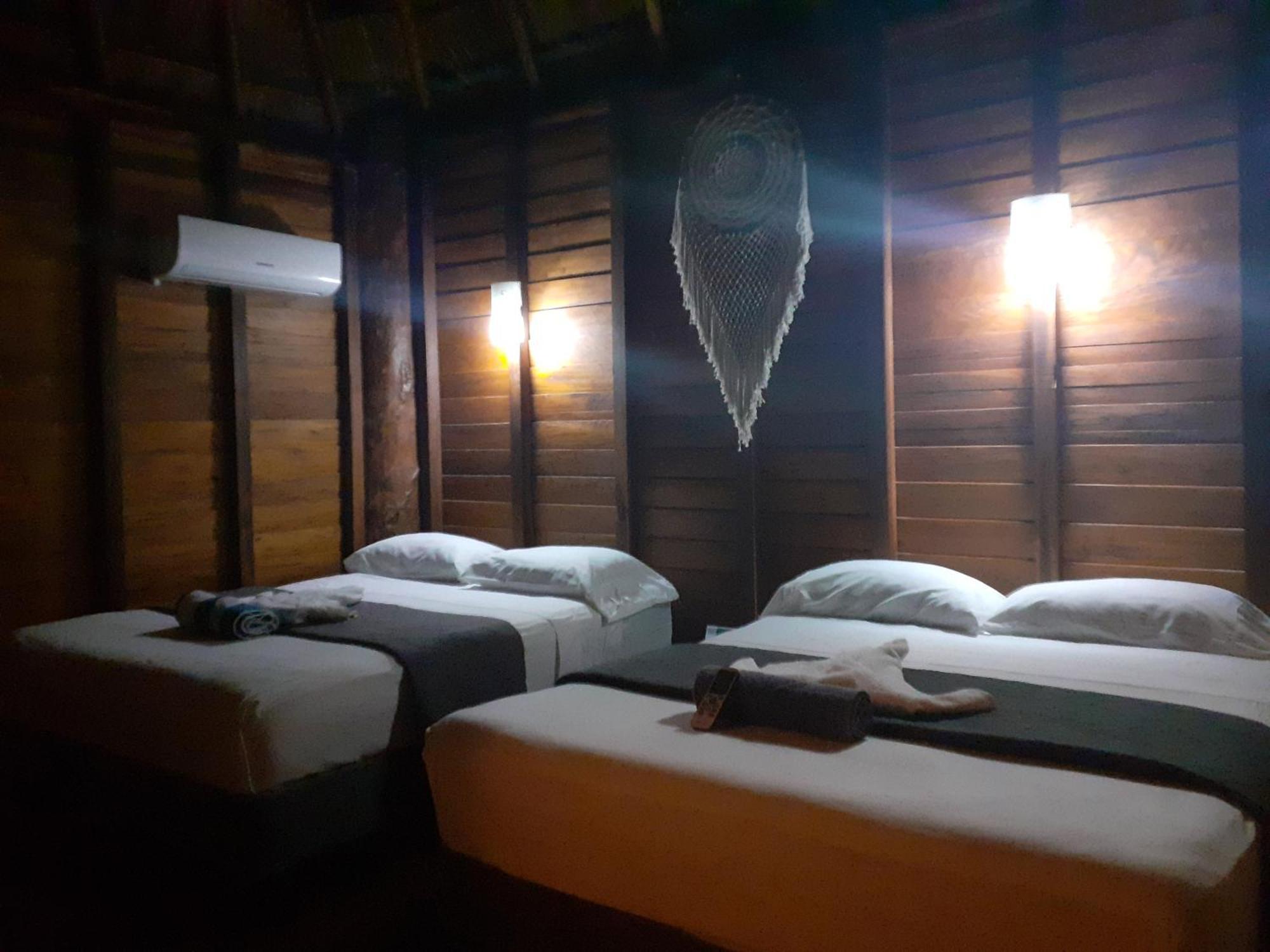 Palmeras De Mahahual Cabanas Стая снимка