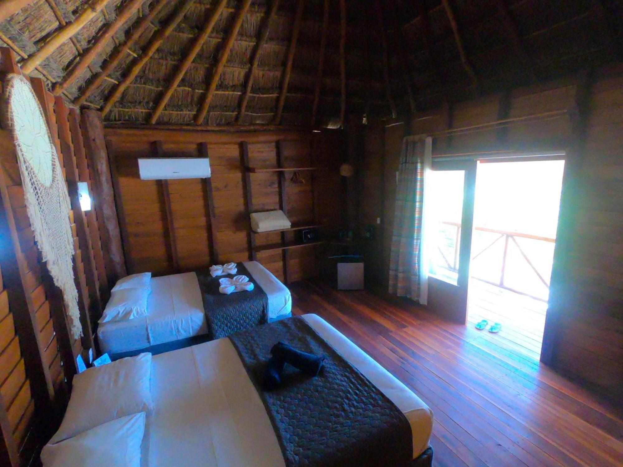 Palmeras De Mahahual Cabanas Стая снимка
